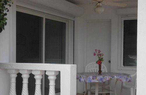 Tamarind Hill Estates Apartment | Ideal Oceanfront Apartment in Gated Estate with Pool