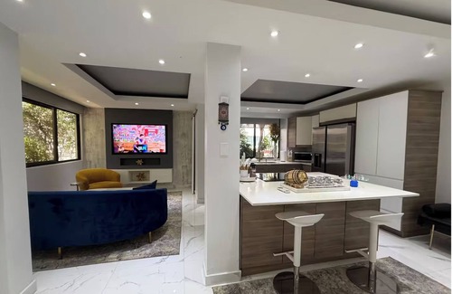 Santurce Apartment | Newly renovated, beautiful, modern, luxury 3BR/2BA in Condado. Steps from the beach, restaurants & shops. 5 min to Old San Juan & Isla Verde. Full kitchen, Wi-Fi, office, parking, washer/dryer & jacuzzi tub. Perfect for groups or family stays.