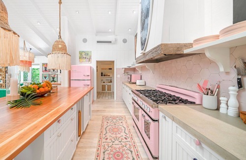 Dunmore Town House | Stylish Retro Bungalow Just Steps from the Beach & Pool