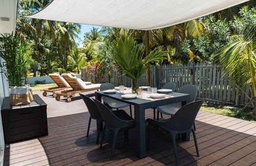 Dunmore Town Cottage | Renovated Coastal Cottage Steps from Pink Sand Beach