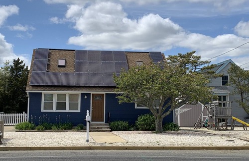 Surf City House | Renovated Cape Cod Escape: Oceanfront Family Retreat