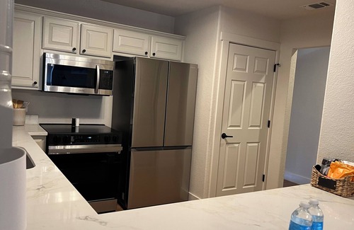 Graford House | Scenic Lake Front Condo Steps from Marina & Pool Access