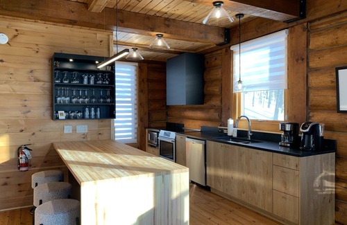 Lac Superieur Village Ski Chalet | Renovated Log Home with Private Spa & Lake Access