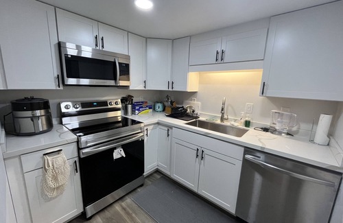 Annandale House | Renovated Master Bedroom with Kitchen Access & Private Bath