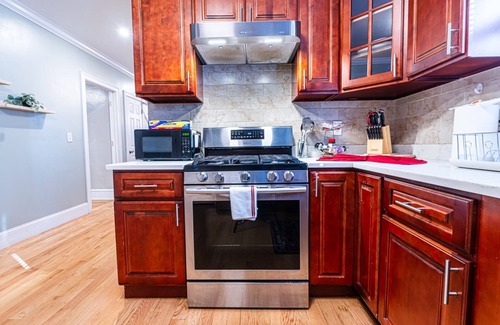 Neponset - Port Norfolk Apartment | Modern Retreat Near T | Pet and Child Friendly Escape