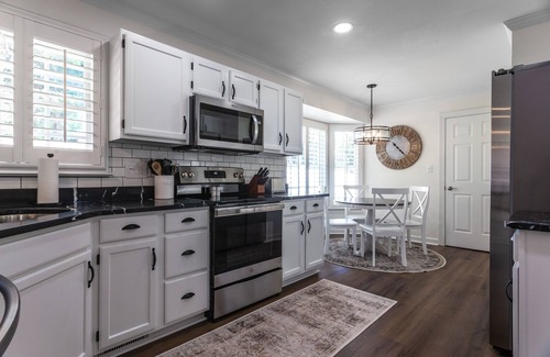 Cary House | Modern Getaway in Cary with Spa and Breakfast Included