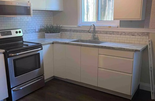 St. Catharines House | Renovated 2 Bedroom Basement Apartment with Kitchen Access