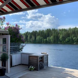 Vindeln Municipality House | Newly Renovated Red Riverfront House