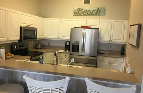 Charlotte Harbor Condo | Renovated Condo with Ocean View & Pool on Charlotte Harbor