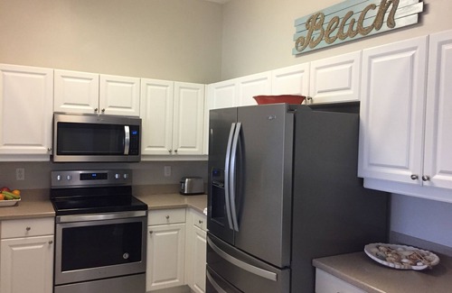 Charlotte Harbor Condo | Renovated Condo with Ocean View & Pool on Charlotte Harbor