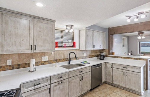 Gravois Mills House | Newly Updated Interior, Sunroom w/Hot Tub, Deck, Deep Water Dock, Boat & PWC Slips