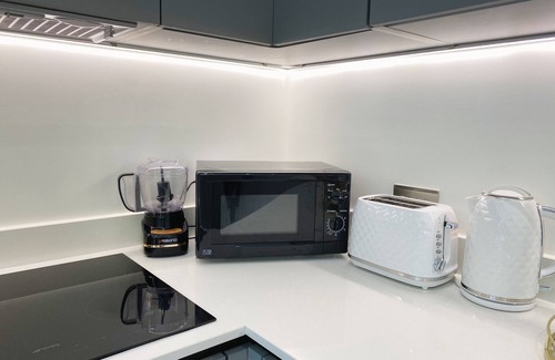 Great Linford Apartment | Stylish Newpointe Serviced Apartment with Breakfast Included