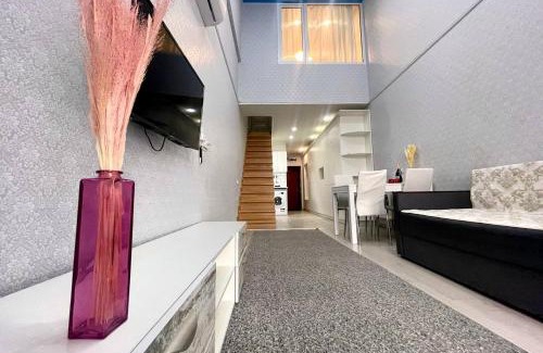 Kharkiv Apartment | Discover NewStyle: Family-Friendly with Breakfast & Hot Tub