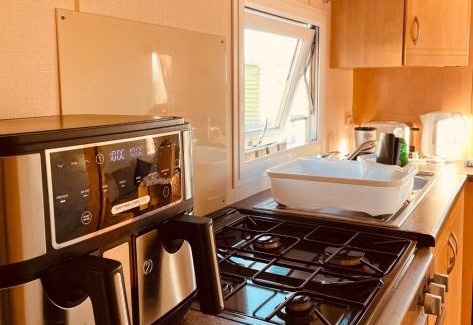 Balminnoch House | Family-Friendly Three Lochs Caravan with Pool & Pet Access