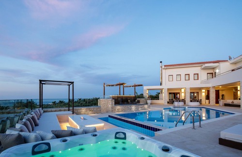 Xiro Chorio Villa | Seaside Retreat with Panoramic Views & Indoor/Outdoor Pools