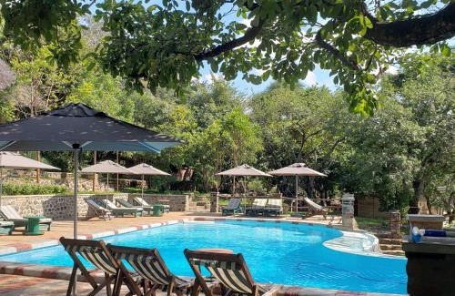 Southern Region Cabin | Ng'ona Lodge: Guest Rated 9/10 with Pool & Breakfast