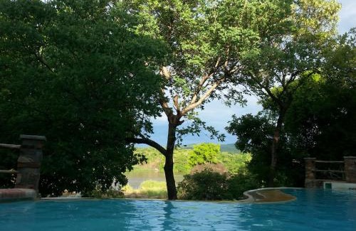 Southern Region Cabin | Ng'ona Lodge: Guest Rated 9/10 with Pool & Breakfast
