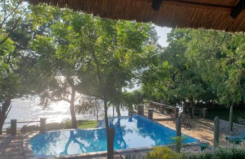 Southern Region Cabin | Ng'ona Lodge: Guest Rated 9/10 with Pool & Breakfast