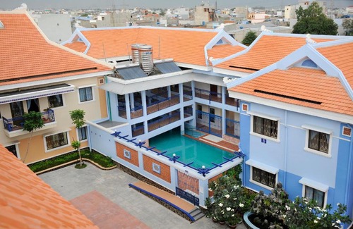 Binh Tan House | Discover Nhà Khách Làng May Mắn with Pool & Family Amenities