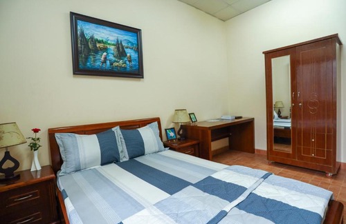 Binh Tan House | Discover Nhà Khách Làng May Mắn with Pool & Family Amenities