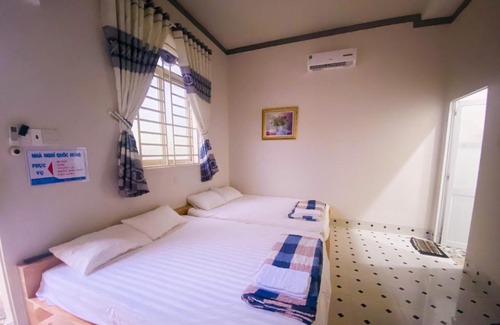 Vinh Cuu Bed & Breakfast | Discover Nhà Nghỉ Quốc Hưng: Family-Friendly Stay Awaits