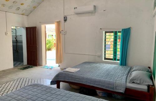Dong Hoa House | Pet-Friendly Retreat at Nhà Tranh for Families