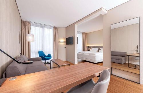 Munchen District Apartment | Elegant NH München Unterhaching: 4-Star Comfort Awaits
