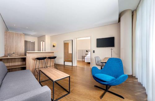 Munchen District Apartment | Elegant NH München Unterhaching: 4-Star Comfort Awaits