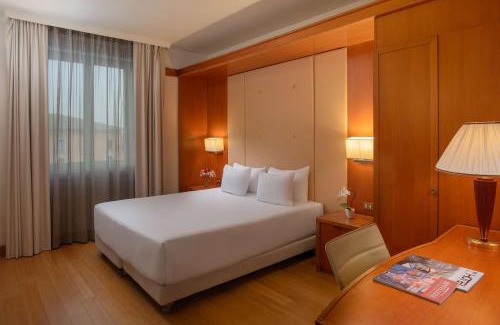 Pisa City Centre Hotel | Discover NH Pisa: Pet Friendly with Pool & Breakfast Included
