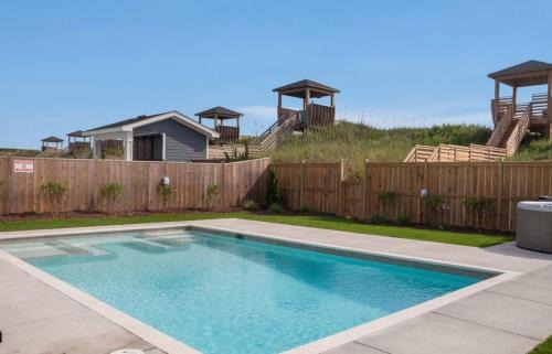 Nags Head House | Relax at NH140 Sunset Beach House with Oceanfront Pool Views