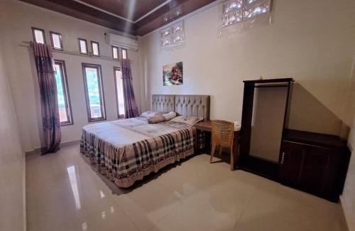 Nias House | Discover Nias Shady Palm Surfcamp: Family-Friendly Escape