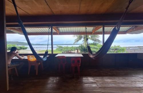 Nias House | Discover Nias Shady Palm Surfcamp: Family-Friendly Escape