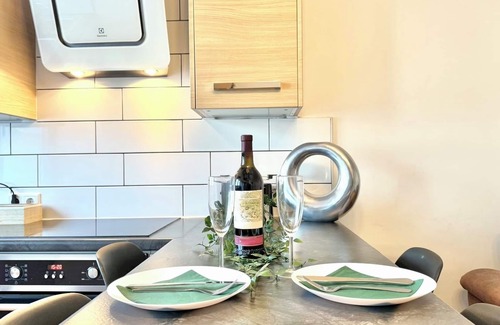 Suedviertel Condo | Prime 2-Bedroom Retreat Steps from Main Station, Rated 10/10