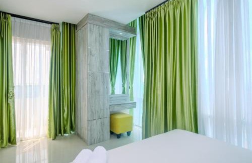 Pondokcina Apartment | Comfortable 2BR Getaway at Atlanta Residence by Travelio