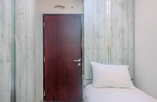 Pondokcina Apartment | Comfortable 2BR Getaway at Atlanta Residence by Travelio