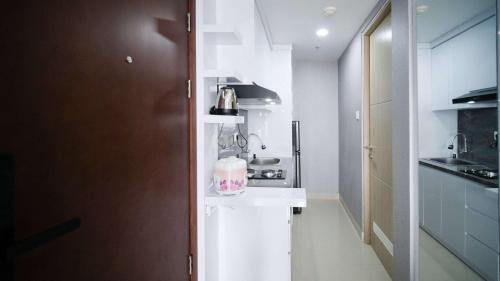 Surabaya Apartment | Cozy Studio at Grand Dharmahusada Lagoon Apartment