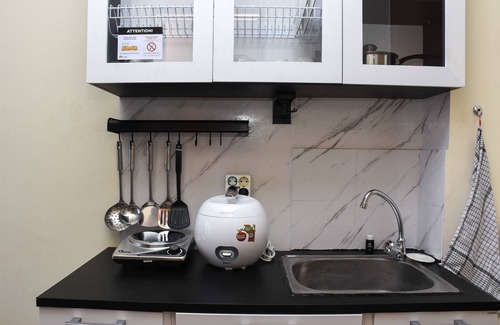 Kayu Putih House | Cozy Studio Retreat at Tifolia Apartment with Pool Access