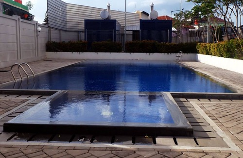 Kayu Putih House | Cozy Studio Retreat at Tifolia Apartment with Pool Access