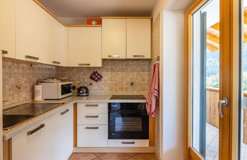 Campitello di Fassa Apartment | Elegant Apartment for 9 with Balcony, WIFI and Parking