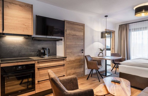 Kirchberg in Tirol Apartment | Nice apartment for 4 guests with pool, WIFI, TV and terrace