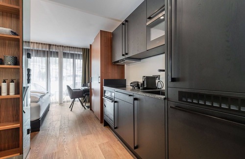 Kirchberg in Tirol Apartment | Nice apartment for 4 guests with pool, WIFI, TV and terrace