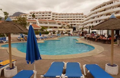 San Eugenio Apartment | Inviting Beachfront Apartment with Pool and Ocean View