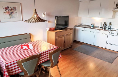 Laax Apartment | Nice apartment for 3 guests with pool, WIFI, TV, balcony, pets allowed, panoramic view and parking