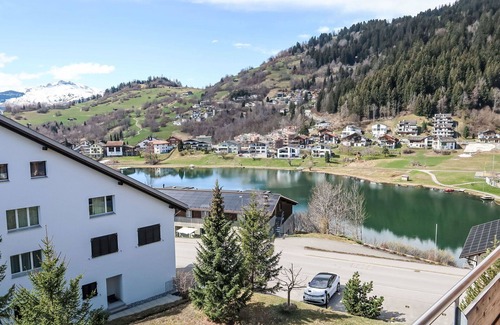 Laax Apartment | Nice apartment for 3 guests with pool, WIFI, TV, balcony, pets allowed, panoramic view and parking