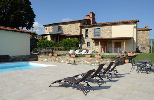Capolona Apartment | Ideal Apartment for 4 with Pool and Pet-Friendly Amenities