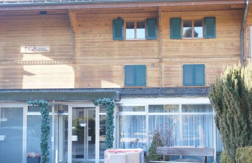 Gstaad Apartment | Cozy Apartment for 4 with Pet-Friendly Amenities & WIFI