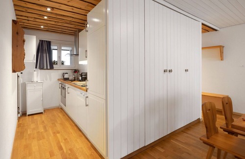 Davos-Dorf Apartment | Nice apartment for 4 guests with pool, WIFI, TV, balcony and parking