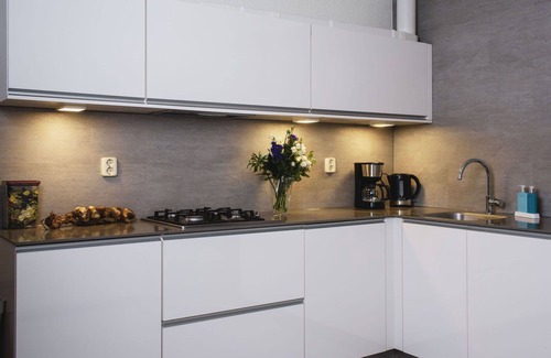 Municipality of Delfzijl Apartment | Cozy Apartment with Terrace, WIFI, and Lake View Awaits