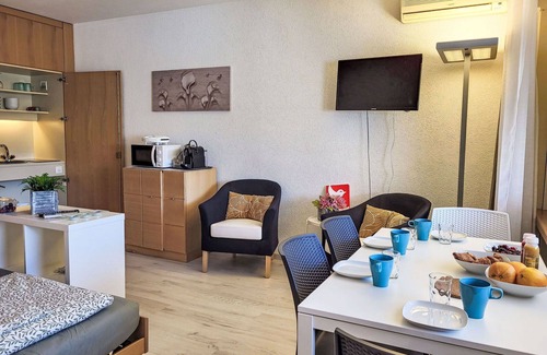 Bissone Apartment | Nice apartment for 4 people with WIFI, A/C, pool, TV, balcony and panoramic view