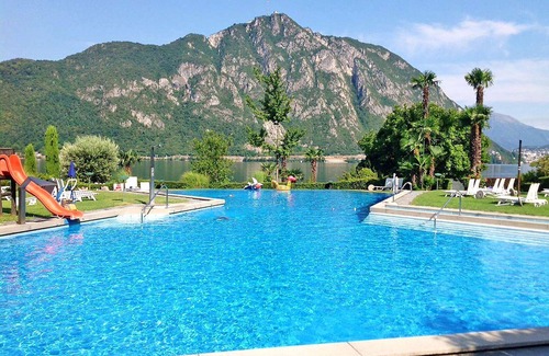 Bissone Apartment | Nice apartment for 4 people with WIFI, A/C, pool, TV, balcony and panoramic view
